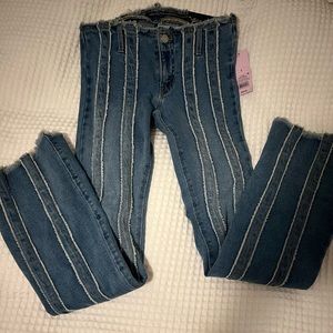 Stars above women’s flare jeans